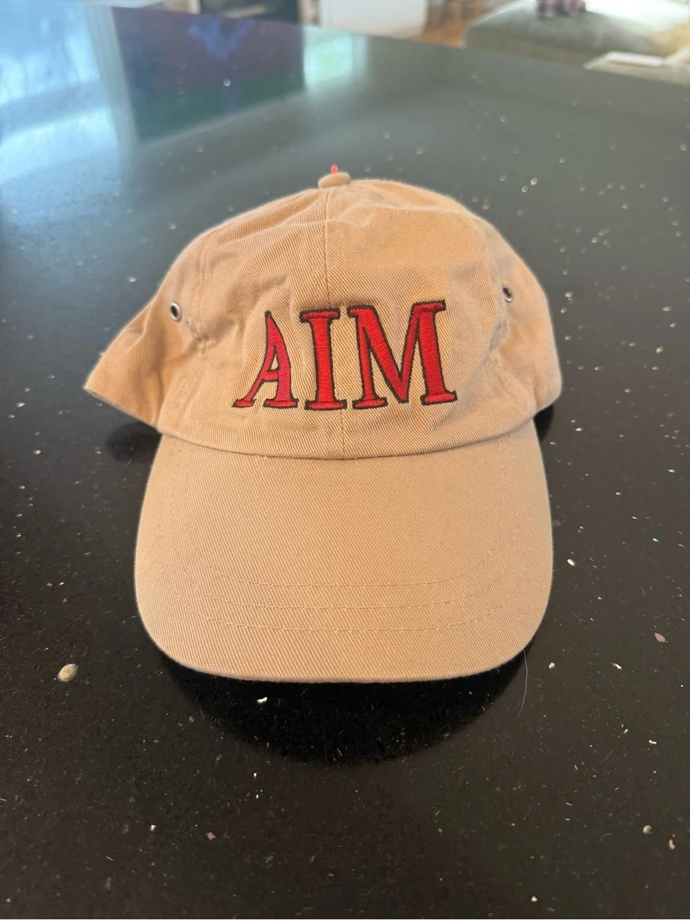 Beige 'AIM' Embroidered Baseball Cap - Red Logo